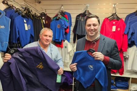 Tees Valley Mayor Ben Houchen (R) shows off his old Whinstone School uniform with Motif8 Managing Director Chris Pomfret (L)