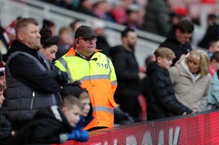 A steward at the Riverside Stadium Middlesbrough watches the action with the crowd