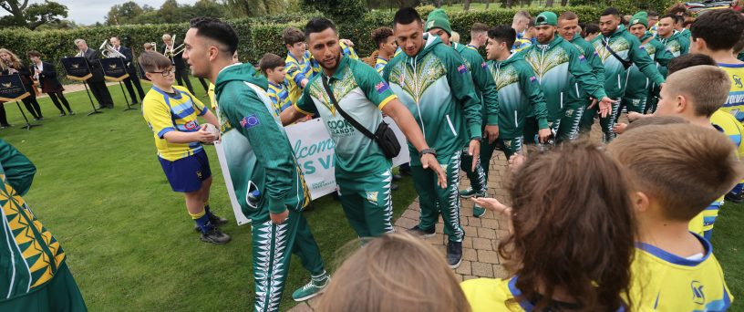 Cook Islands Rugby League World Cup squad arriving at Rockliffe Hall being greeted by youngsters from Yarm Wolves ARLFC