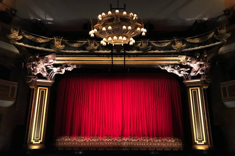 Red curtain at a performance theatre