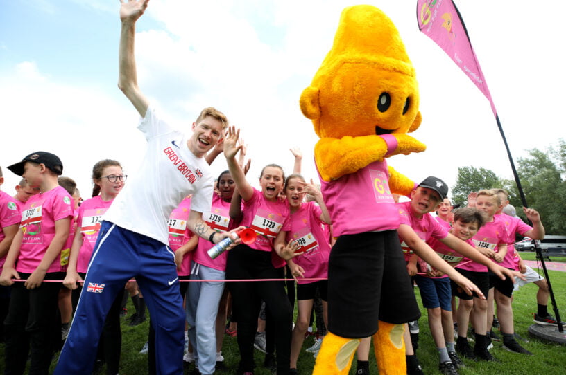 Tom Bosworth with runners and Go Run For Fun mascot | Tees Valley Combined Authority